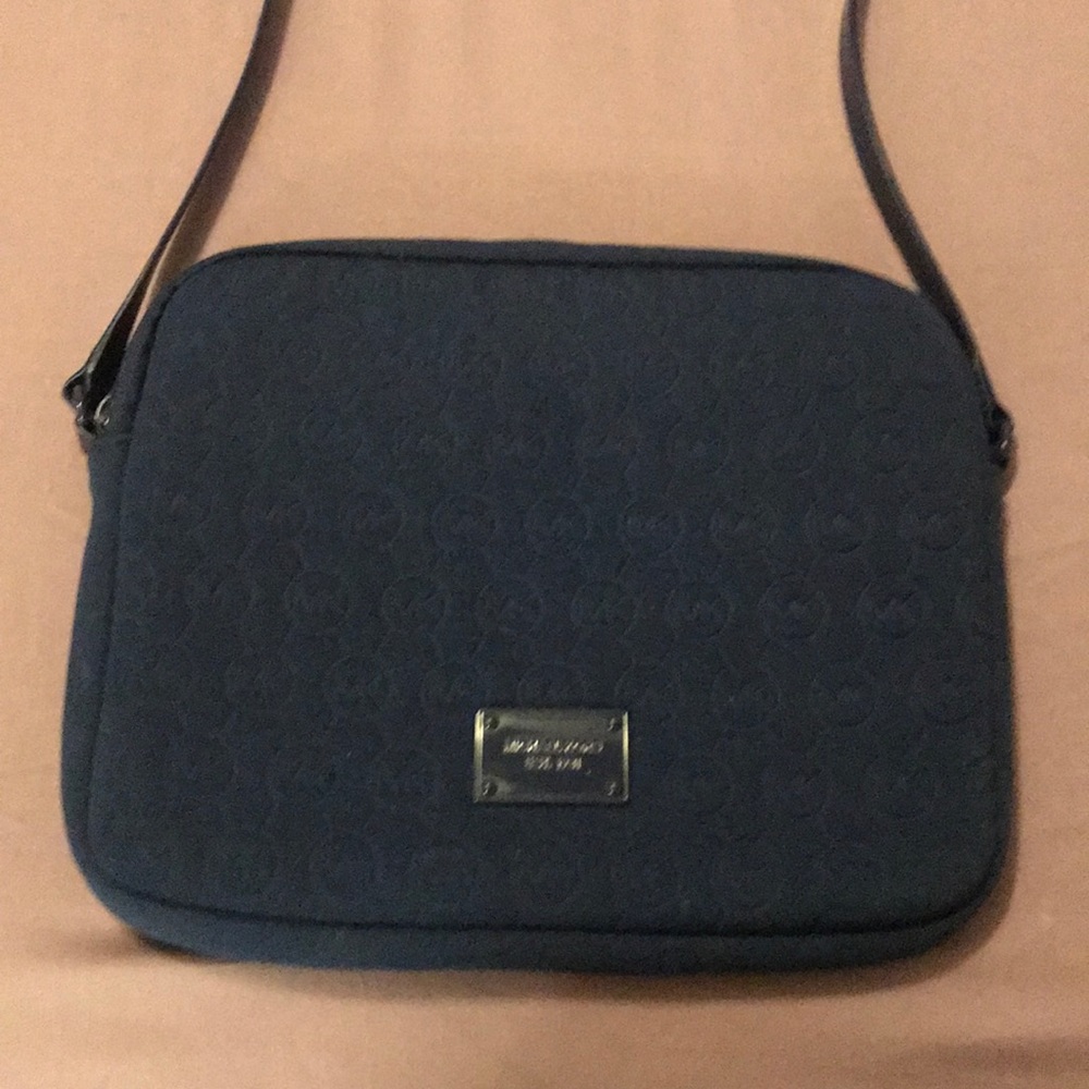 Michael Korda tablet purse